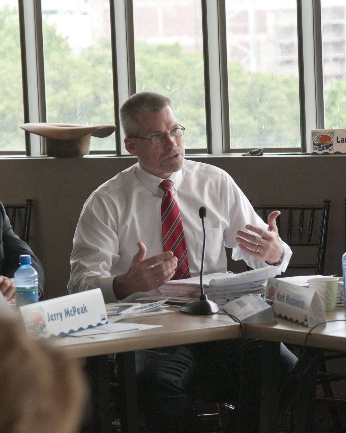 People talking around a conference table